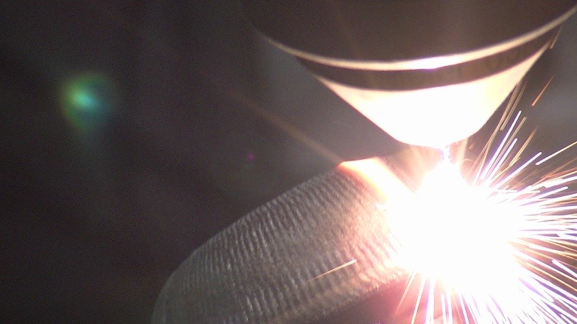 Laser hardfacing mining bit