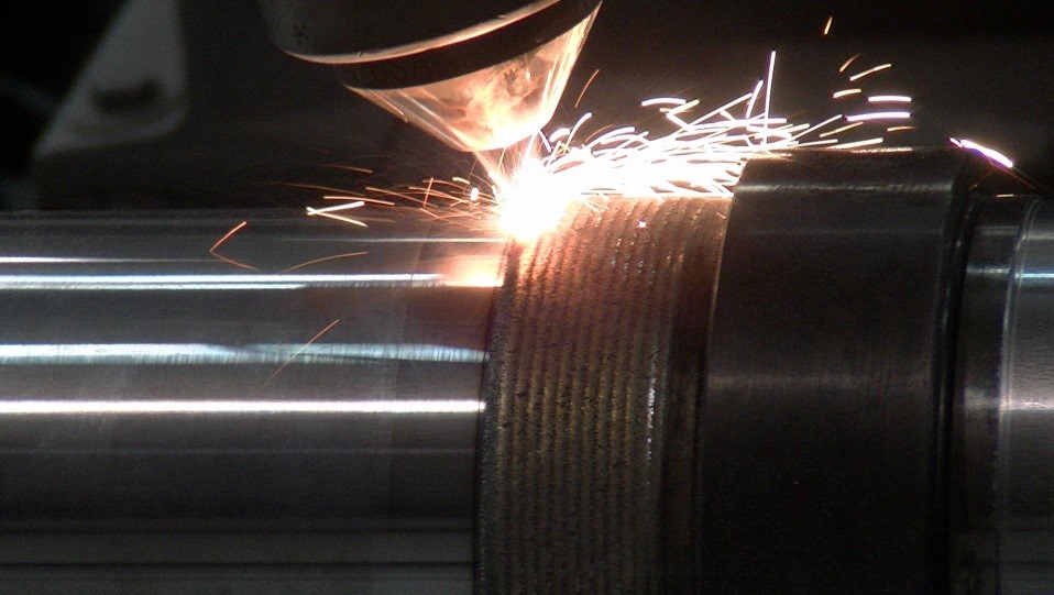 Laser cladding steel mill shaft